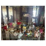 Shelf lot of animal figurines- dogs, cats, mice