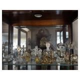 Shelf lot of crystal collectible decor