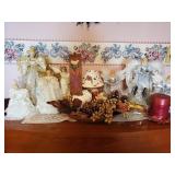 Dresser top of Christmas angels and other