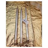 3 silver candlesticks