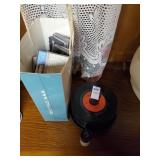 Stack of 45 records & bag of cassettes