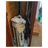 Super J vacuum & attachments in kitchen cabinet