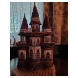 Handmade ceramic castle w/ crochet doily