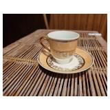 6 small German cups and saucers