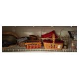 Shelf lot of baskets, pillows, misc