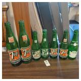 Lot of 7 vintage 7up and Canada dry bottles