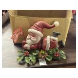 Vintage plastic santa with present