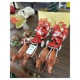 Set of 2 vintage plastic santas on sleigh,