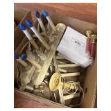 Box of vintage candelabras and newer candle