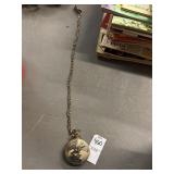 Vintage gold-tone quartz pocket watch with