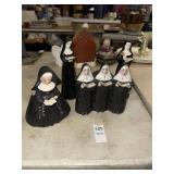 Lot of vintage nun figurines and planters