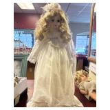 Vintage porcelain bridal doll with music box