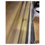 2 vintage beige roll up projector screens and