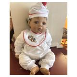 V.E. Turner Baby Doll, vinyl face, weighted cloth