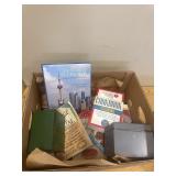 Lot of cookbooks, recipe holders and other books
