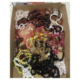 Flat of vintage estate costume necklaces