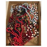 Flat of vintage estate costume mostly beaded