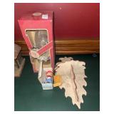 Oil lamp, shelf and figurine
