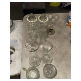 Lot of glass cups and candleholders