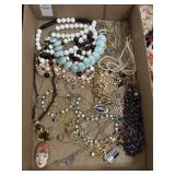 Flat of vintage estate costume necklaces