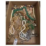 Flat of vintage estate costume necklaces