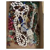 Flat of vintage estate costume necklaces