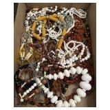 Flat of vintage estate costume necklaces