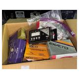 Box of guitar tuners, reeds and electron tubes