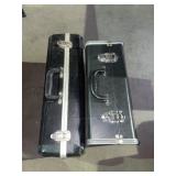 2 empty music cases