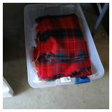 Tote of Christmas table cloths