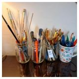 Lot of 4 jars of paintbrushes and pens