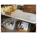 Plastic folding table ** no contents **