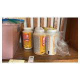 Shelf lot of water-based glue and crafting items