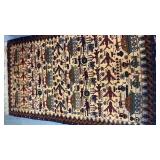 A hand-knotted Afghan war rug/detailed military