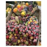 Flat of fruit ornaments in wire basket and