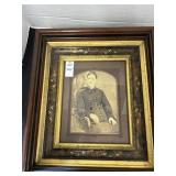 Vintage portrait photograph displayed inside an