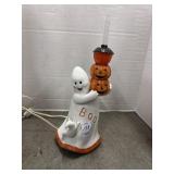 Ceramic ghost figurine holding bubble light (no