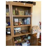 Bookcase 3 shelves with cabinet at bottom.