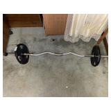 curl barbell equipped with 10 lbs weight plates.