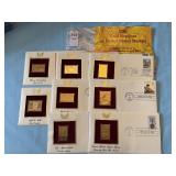 Eight U.S. stamp replicas on 22kt gold surface