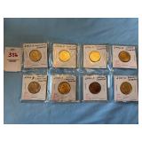 Eight U.S. State quarters with BU gold tones