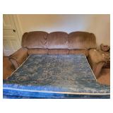 Couch hida a bed bring help to remove