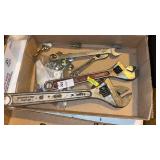 Adjustable wrenches