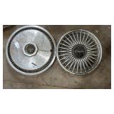 2 vintage hubcaps