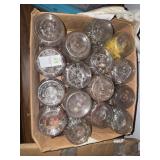 box with 16 peanut butter jars of hardware
