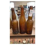 3 vintage brewing bottles