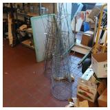 2 stacks of tomato cages