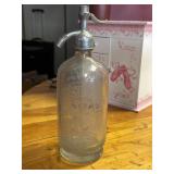Vintage Schuller seltzer bottle filled by D.W