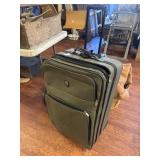 Green Leisure 5 piece suitcase set