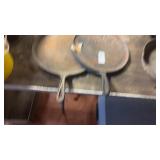 Two Cast Iron Griddles